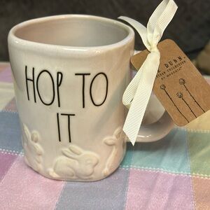 Rae Dunn “Hop To It “ mug
Designed for the Easter Season 
By Magenta